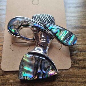 Silver and Iridescent Lady Brooch.